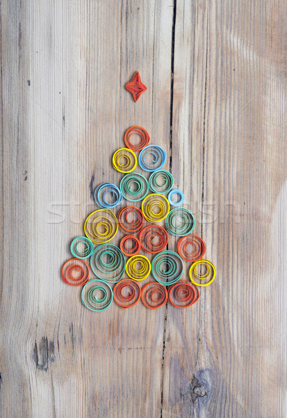 Christmas tree made of paper on wood background Stock photo © inxti