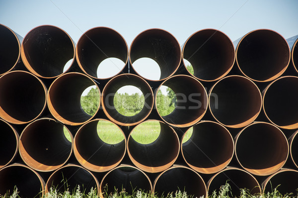 closeup of a pile of large and rusting steel pipes Stock photo © inxti