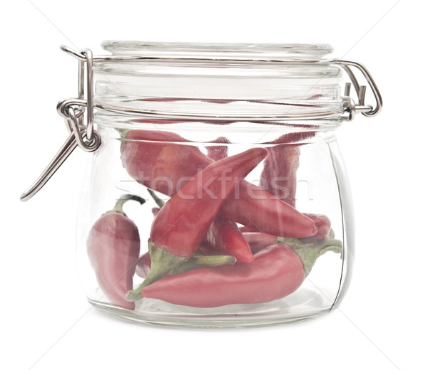 fresh red hot chilli chilies pepper in a glass jar, isolated on  Stock photo © inxti