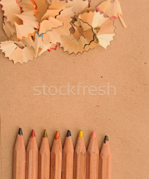 colorful pencils with wooden shaving on recycle paper Stock photo © inxti