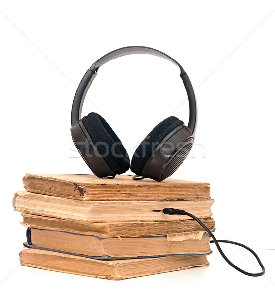 black headphones and book on a white background Stock photo © inxti