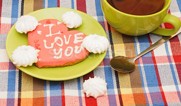 tea cup with sweet heart shaped cookie on colorful napkin Stock photo © inxti