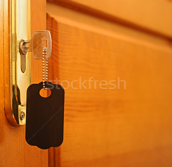 Kulcs kulcslyuk címke iroda ház fa Stock fotó © inxti