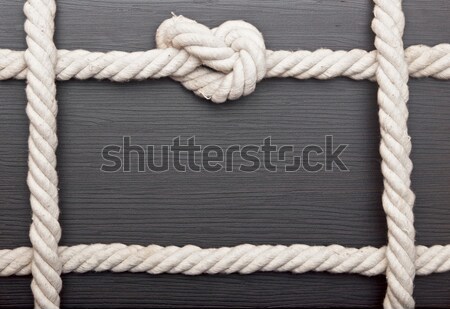 frame made of rope on a wooden background Stock photo © inxti