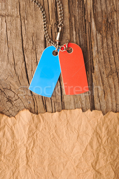 blank tags blue and red with silver chain on vintage background Stock photo © inxti