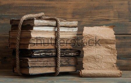 Scrolls of vintage paper with old book  Stock photo © inxti