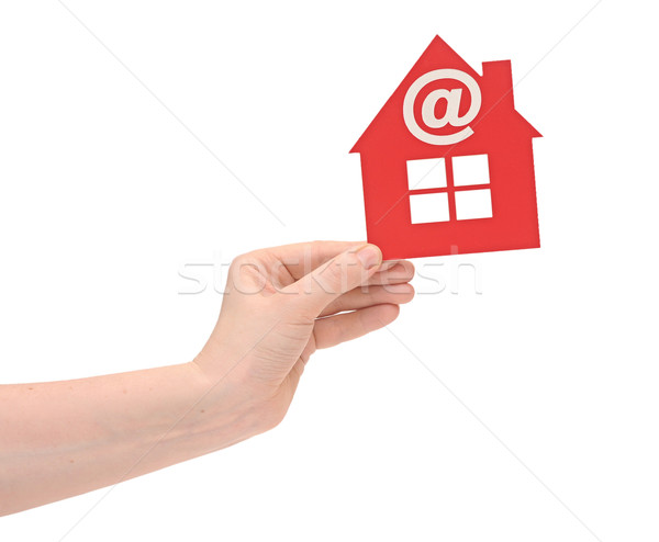 woman hand holding small red plastic house with email icon on wh Stock photo © inxti