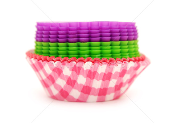 Cupcake cases on white background Stock photo © inxti