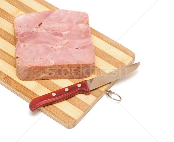 Sausage next to a knife on a cutting board Stock photo © inxti