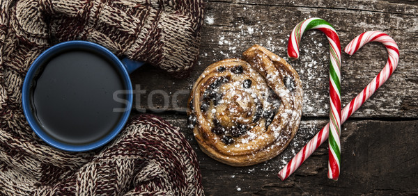 Mug of hot tea or coffee with scarf. Christmas decorations. Stock photo © inxti