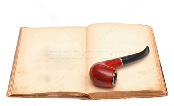 Opened empty old book with pipe  Stock photo © inxti