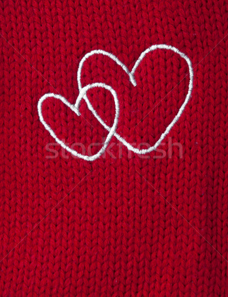 two white heart embroidered handmade on red canvas  Stock photo © inxti