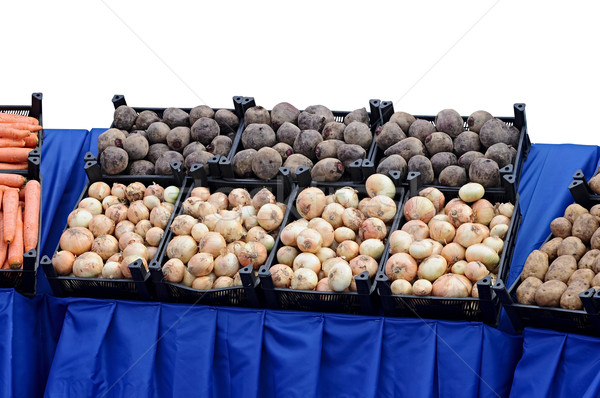 Stock photo: Ripe beets and onions in shop in a box