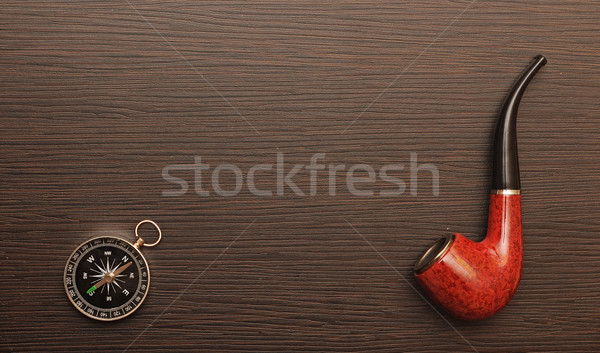 Compass and pipe on the old background Stock photo © inxti