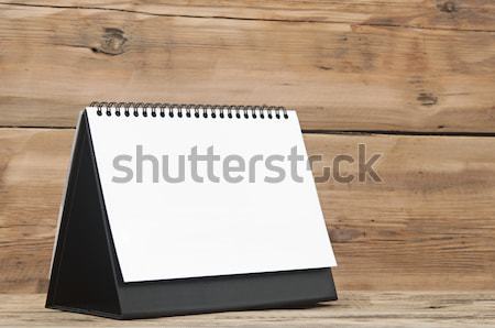 Stock photo: Blank calendar on wood table 