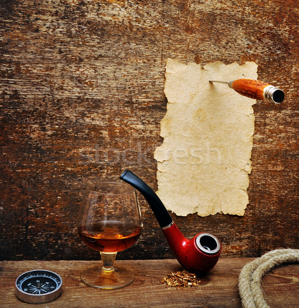 old paper pinned to a wooden wall with a knife Stock photo © inxti
