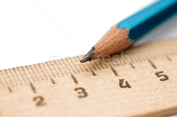 closeup ruler and wood pencil on white  Stock photo © inxti