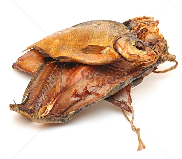 pile smoked fish on a white background Stock photo © inxti