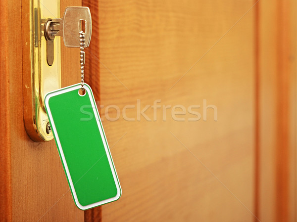 key with blank tag at door Stock photo © inxti