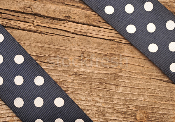 Wooden background with black polka-dot ribbon  Stock photo © inxti