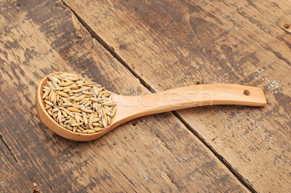 Oat in spoon on wooden table  Stock photo © inxti