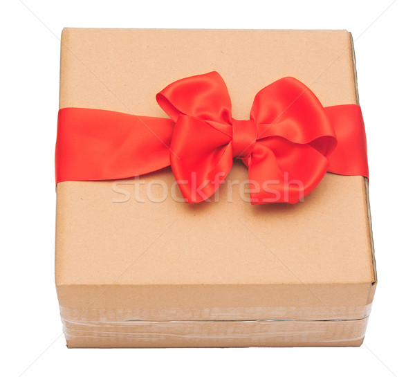 red ribbon bow on cardboard box. holidays background Stock photo © inxti