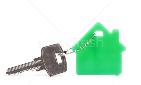 Key with house-shaped charm isolated on white Stock photo © inxti