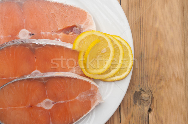 Piatto cottura fette salmone tavolo in legno alimentare Foto d'archivio © inxti