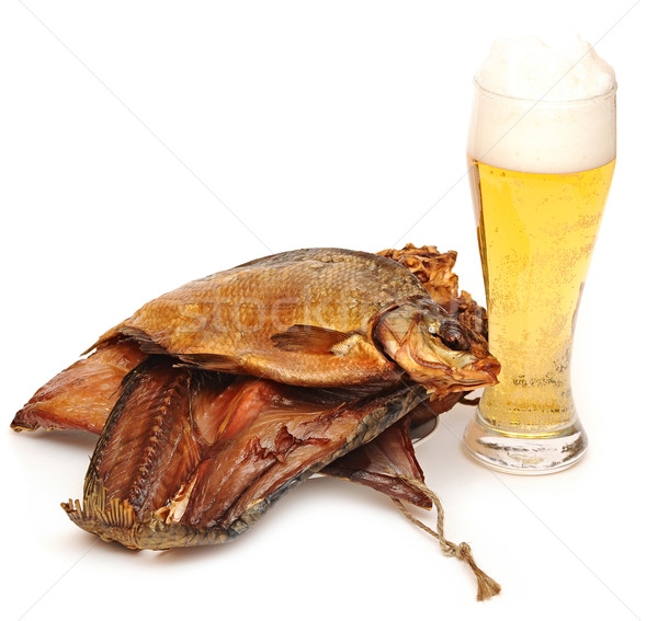 many smoked fish and cup of beer on a white background  Stock photo © inxti