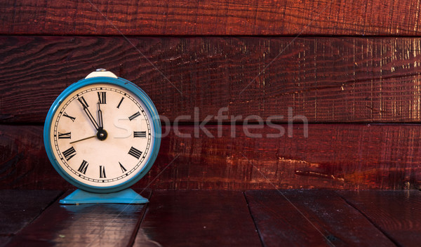 Stock photo: Vintage background with retro alarm clock on table