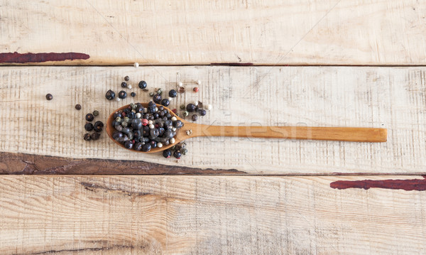  whole peppercorns on wooden spoons Stock photo © inxti