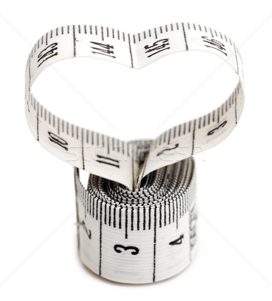 Measuring tape looking as heart  Stock photo © inxti