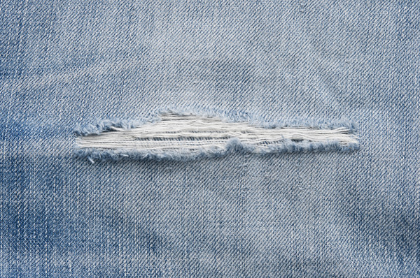 Torn jeans closeup  Stock photo © inxti