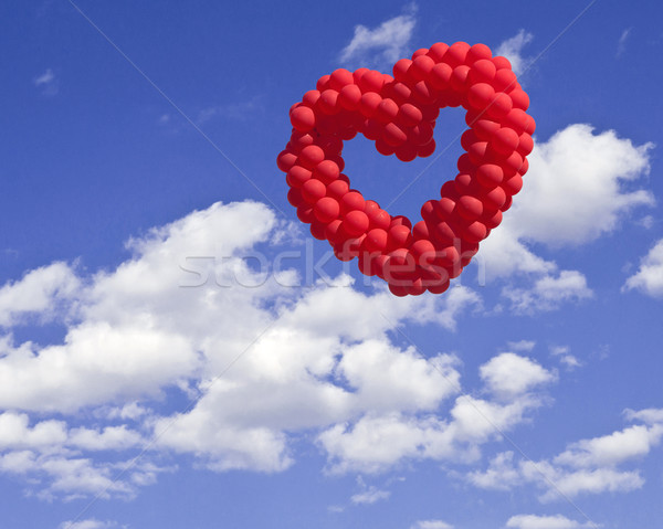 heart-shaped baloons in the sky, the symbols of love Stock photo © inxti