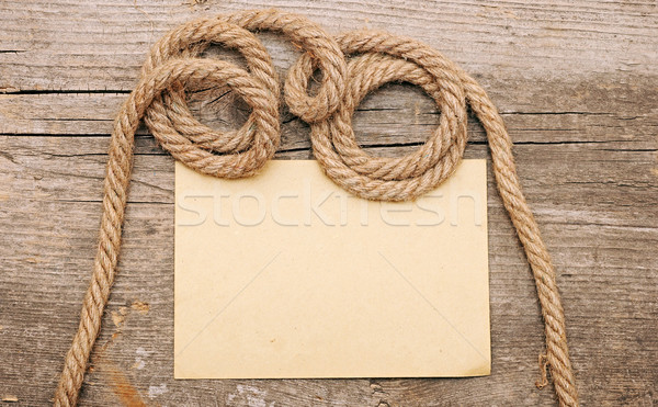 parchment paper and ship ropes on wood  Stock photo © inxti