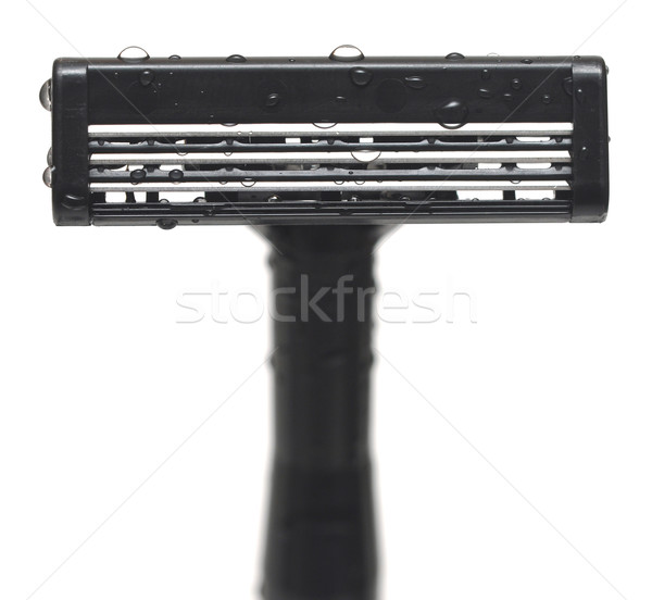 Stock photo: closeup wet razor isolated on white background 