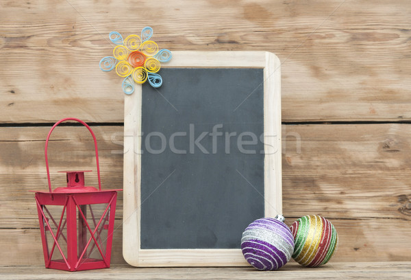 Christmas decoration with framed blackboard on wooden background Stock photo © inxti
