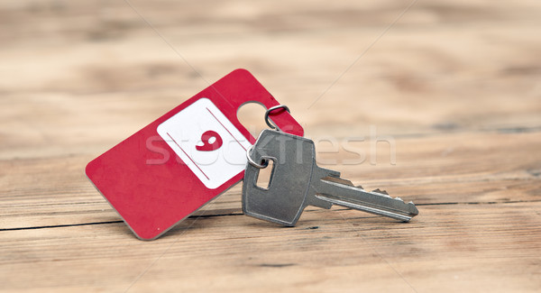 Hotel suite key with room number 9 on wood table  Stock photo © inxti