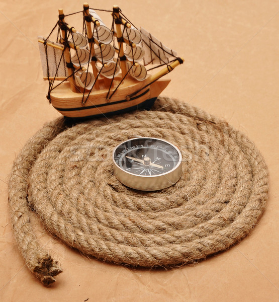 Stock photo: Rope coil with compass in the center 