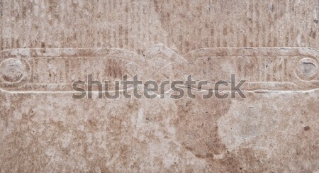 Stock photo: Aged, yellowing paper with creases, stains and smudges. 