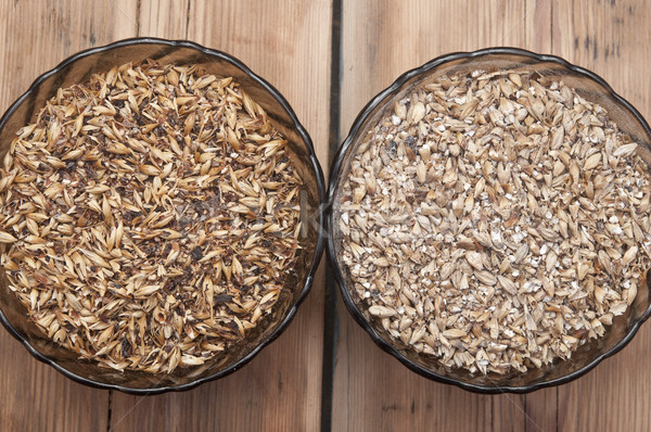 Two glasss bowl with beer ingredients barley malt Stock photo © inxti
