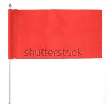 red flag waving on the wind. Isolated over white. Put your own t Stock photo © inxti