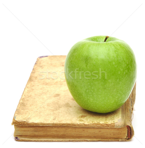 Eski kitap elma yalıtılmış beyaz kâğıt kitap Stok fotoğraf © inxti