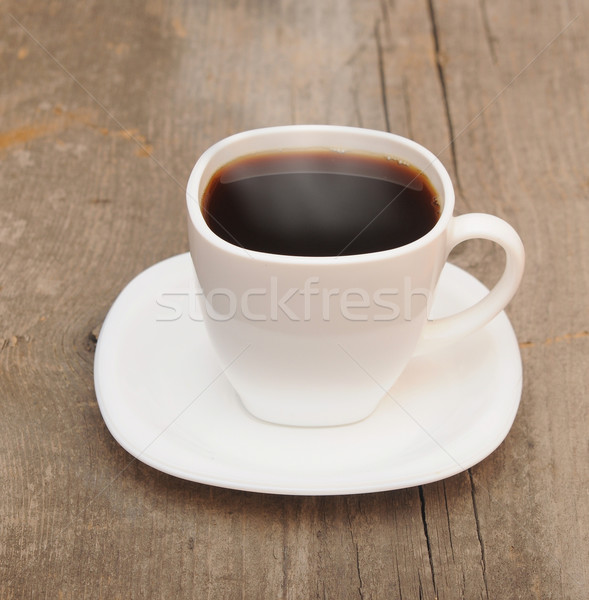 cup of coffee with smoke on brown background  Stock photo © inxti