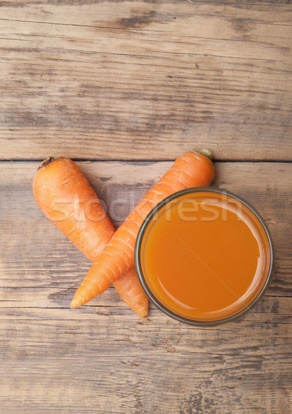 top views healthy food - carrots and carrots juice  Stock photo © inxti