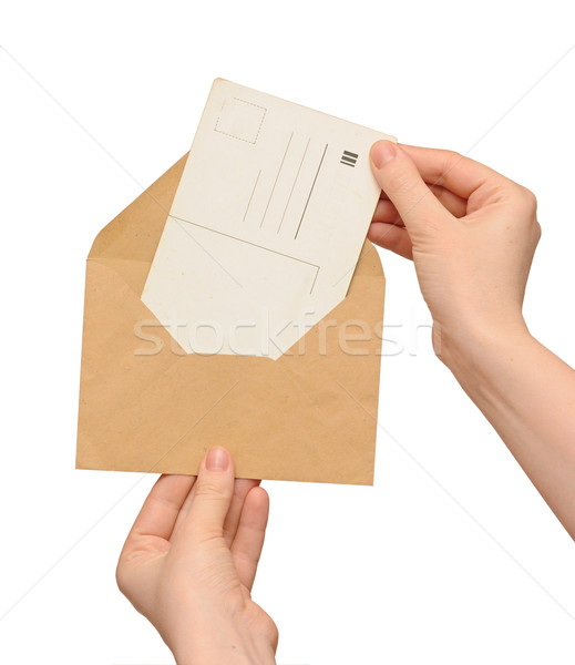 Sarı zarf bağbozumu boş kart el yalıtılmış Stok fotoğraf © inxti