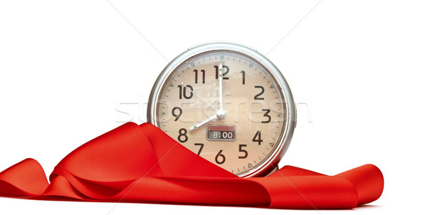 alarm-clock with red ribbon on white Stock photo © inxti