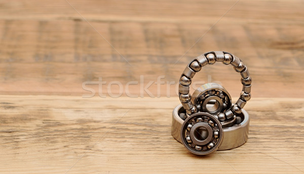 steel ball bearings on wooden table. space for your text Stock photo © inxti