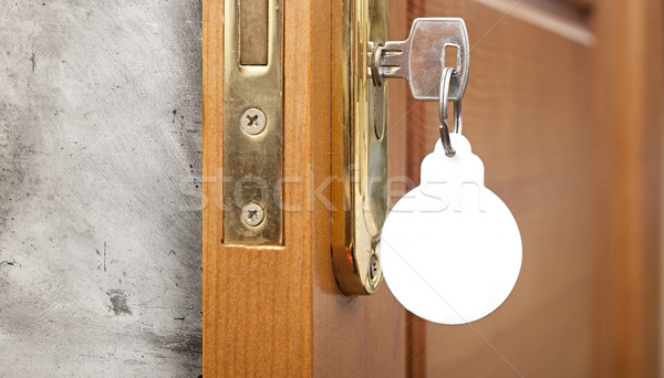 key in keyhole with blank label shape Christmas ball Stock photo © inxti