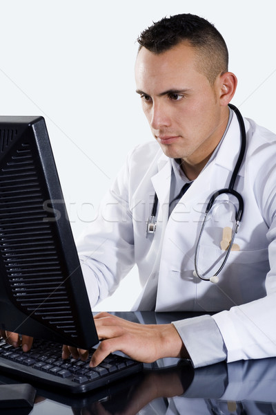 Medico di sesso maschile digitando computer stock immagine medico Foto d'archivio © iodrakon